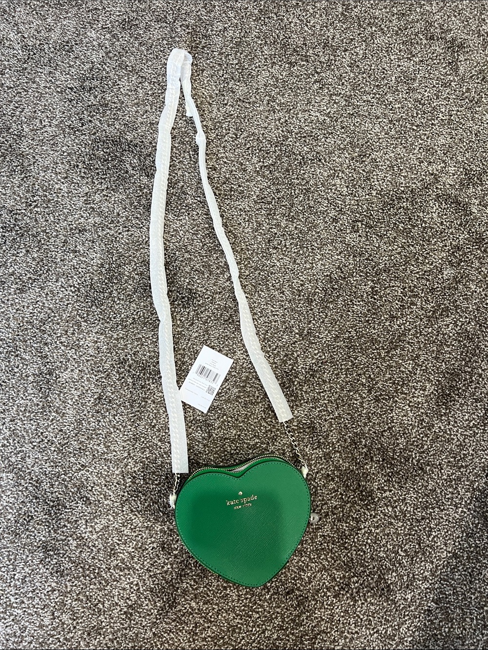 kate spade green heart crossbody with gold logo